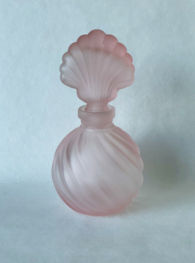Pink frosted glass vanity bottle