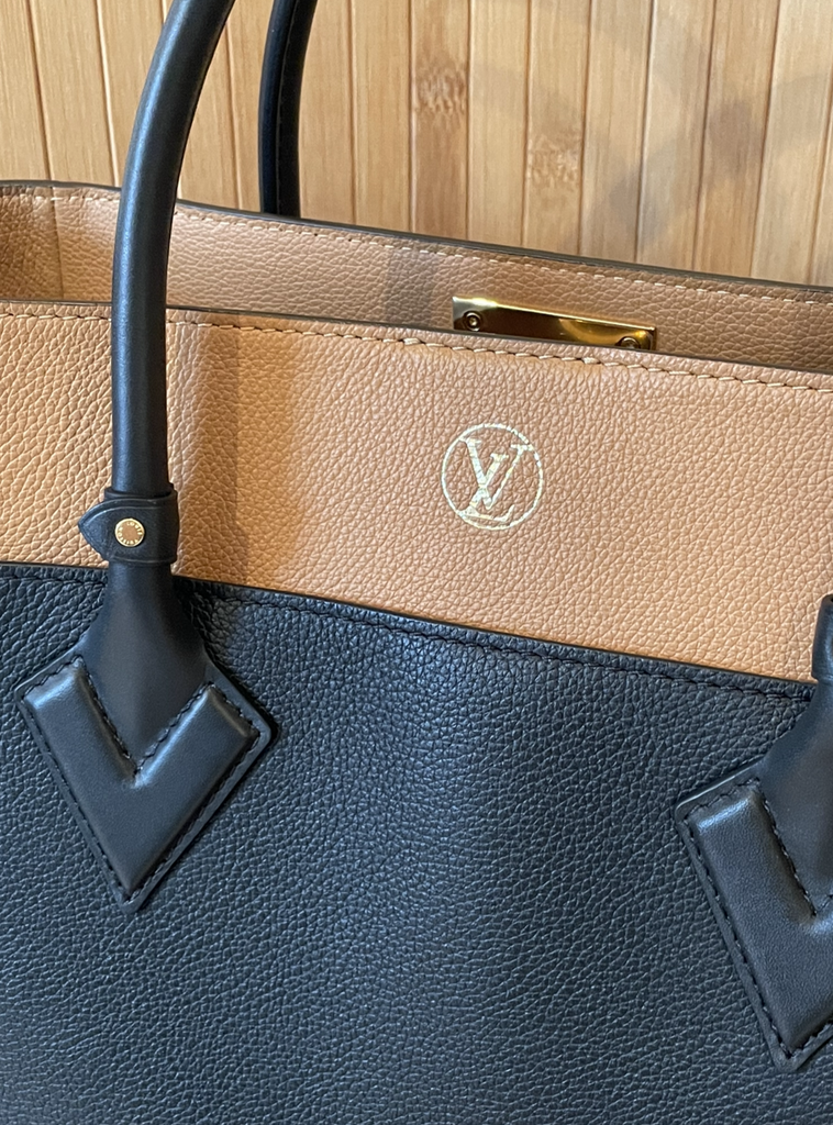 Curated by FAME - Louis Vuitton bag