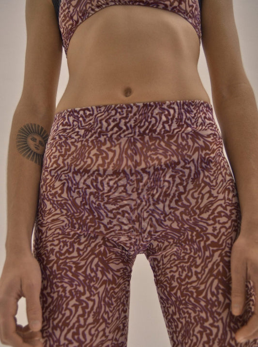 Interiors - Olas print mesh trousers